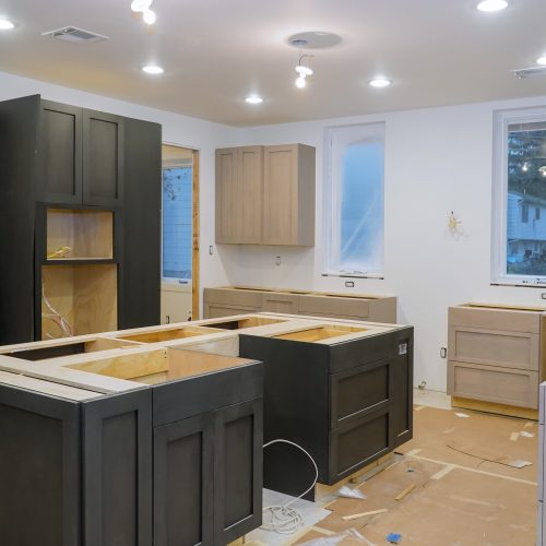 Kitchen cabinets installation Blind corner cabinet, island drawers and counter cabinets installed